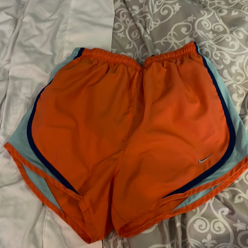 Women’s Nike dri fit orange shorts XS